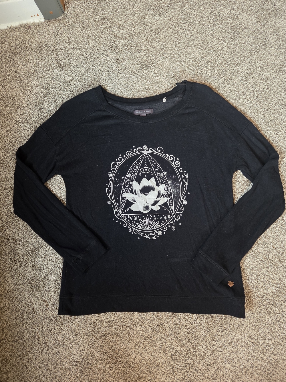 Kendall & Kylie Black Pullover with White Lotus Graphic